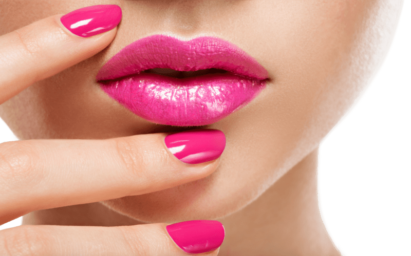 a beautiful women with bright pink lips and nails